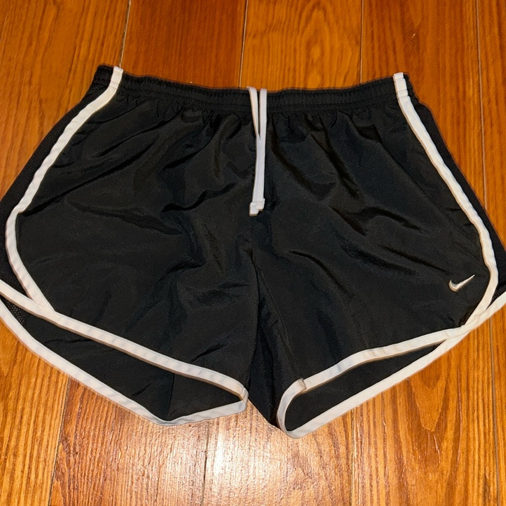 Nike dri-fit women shorts, good condition, black, size medium, cut out lining
